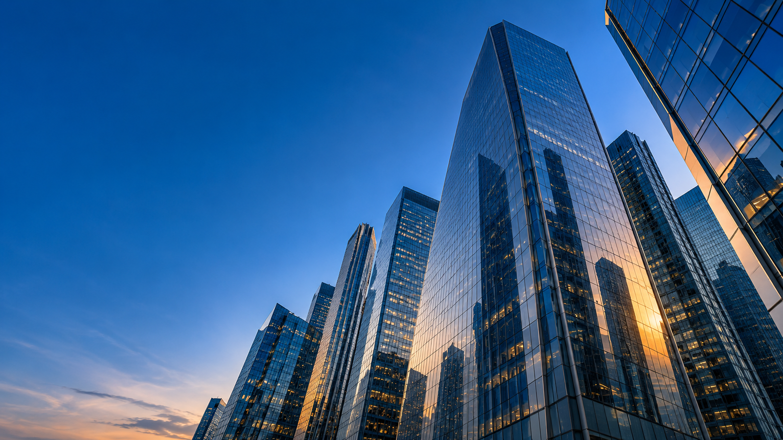 Modern glass architecture representing a forward-looking business perspective